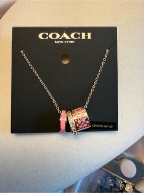 COACH Silver-Tone Necklace with Pink Enamel & Crystal Ring Charms